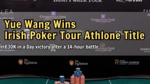 Poker chips and final board on the Irish Poker Tour table with event sponsors in the background