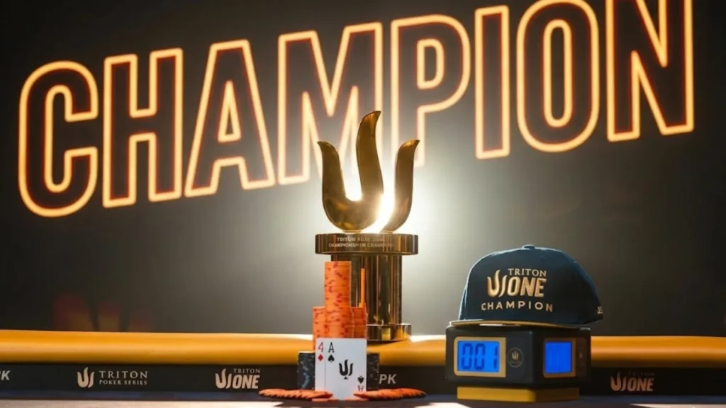 Triton ONE champion trophy and winning hand A-4 on the final table, with "CHAMPION" sign lit up in gold at Jeju